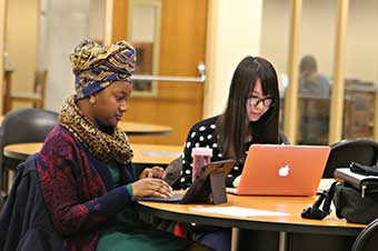 Graduate Students on laptops